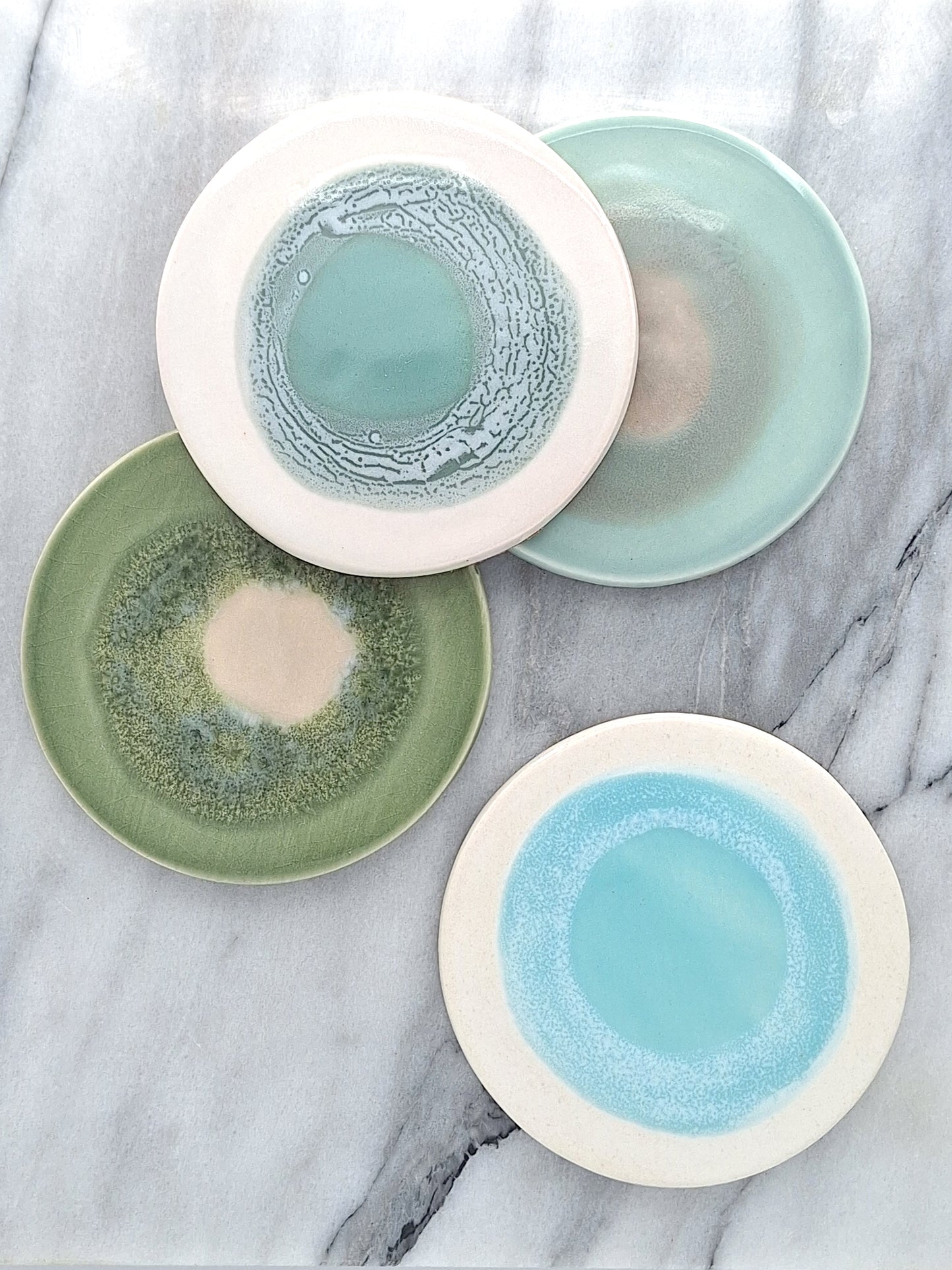 hand painted round coasters | emerald moss
