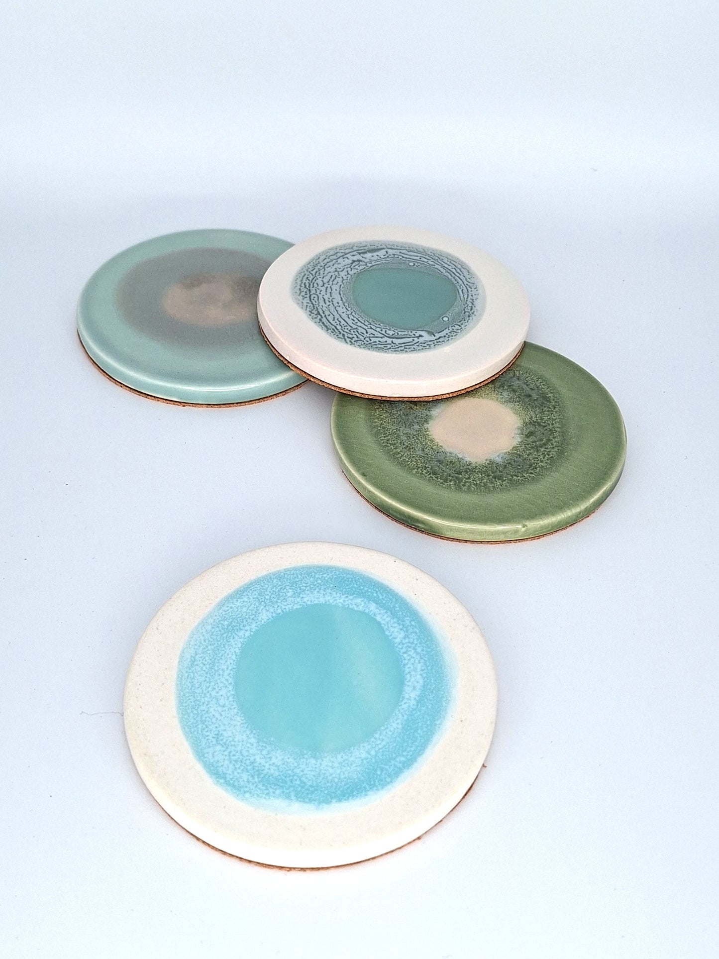 hand painted round coasters | emerald moss